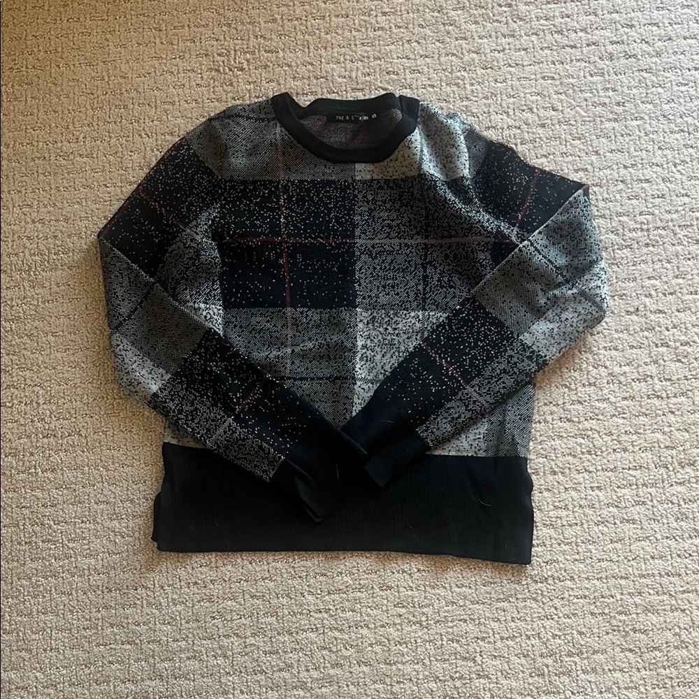 Women’s black and grey plaid sweater